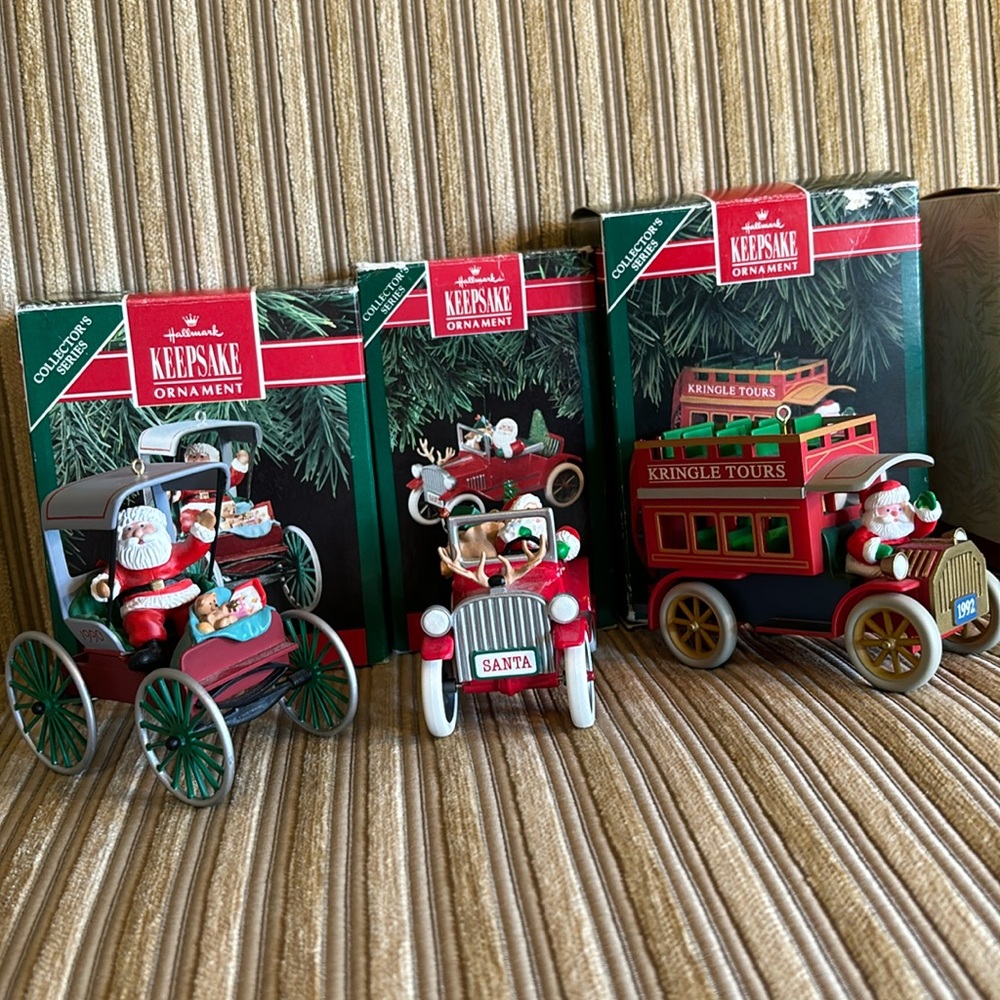 Seven Hallmark “Here Comes Santa Series” ornaments #'s 12 thru 18.